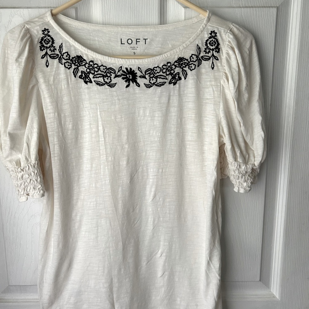 Ann Taylor Loft white tee with navy embroidery. Size small
